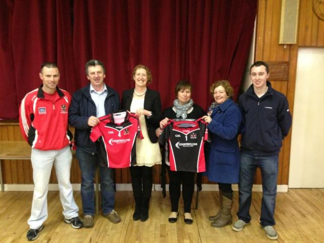 Dave & Mary O'Regan of Country Clean sponsoring the club jersays